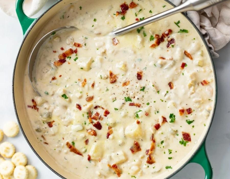 Remove bay leaf, garnish with parsley, and serve warm.